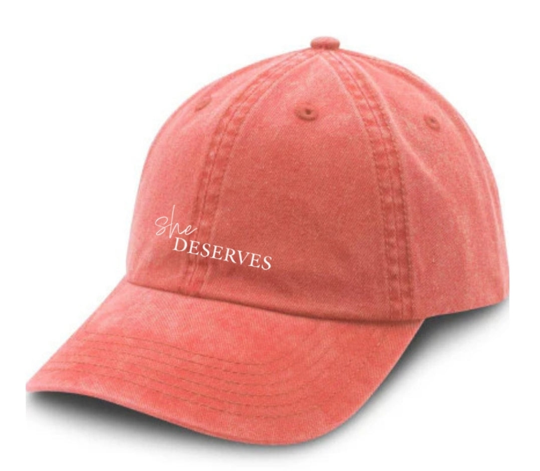 She Deserves Cap – lifestyle image, worn by woman in Sydney