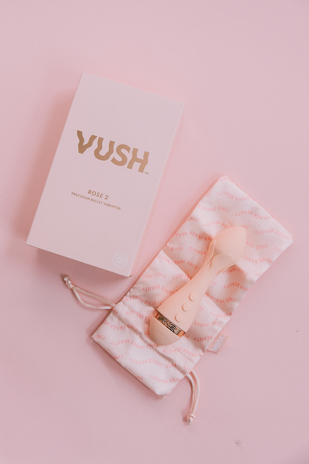 VUSH product packaging on a pink background